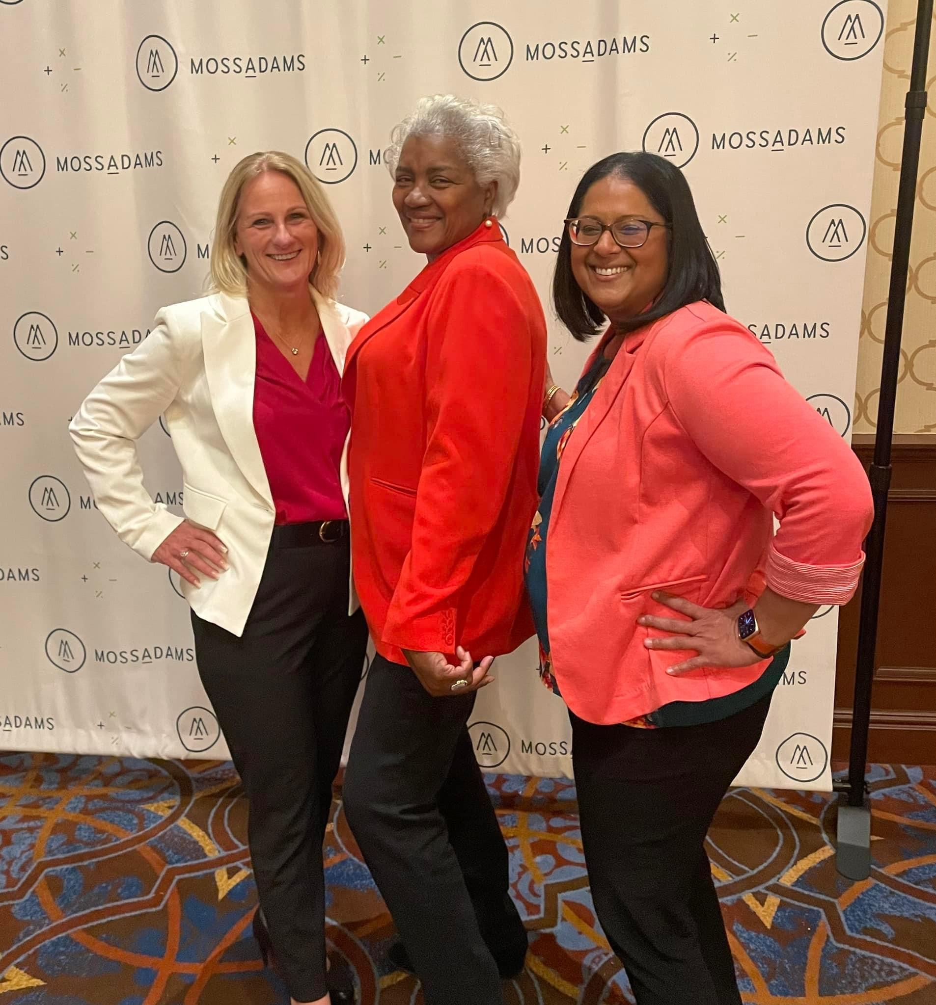 Aparna, Stacy, and Donna Brazile: Three women gather for a photo at a conference. 