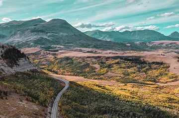 winding road through high desert hills
