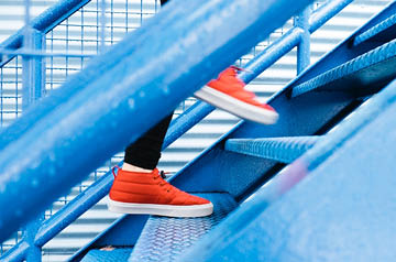 person running up stairs