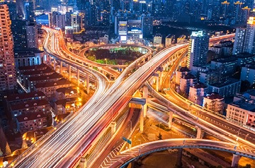 Aerial view of a freeway in a city at night