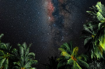 long exposure of night sky reveals Milky Way