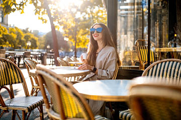 Patio dining girl with espresso