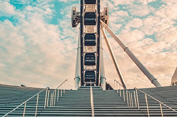 staircase to tall ferris wheel