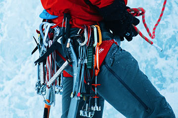 rock climber carrying equipment