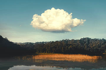 single cloud over lake