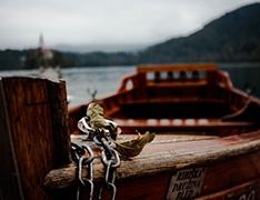 rowboat chained to pier