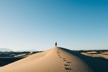 footprints in sand dunes