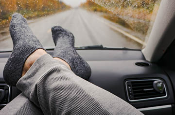feet on dashboard