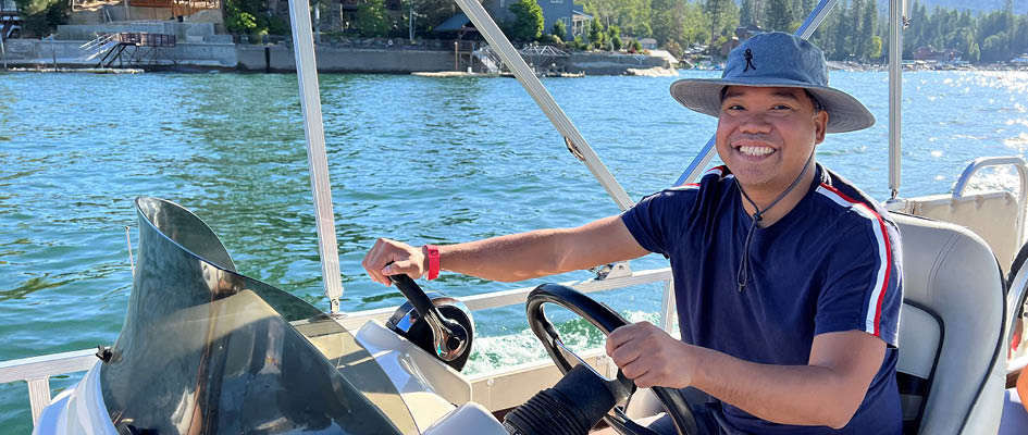 Francisco Sarmiento Jr. driving a small boat