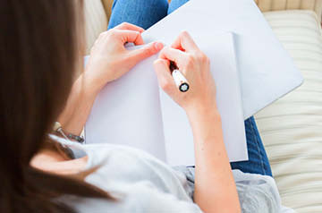 writing in notebook