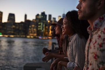 People standing by the waterfront