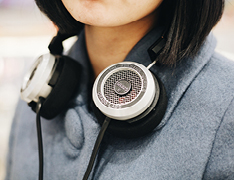 headphones resting around neck