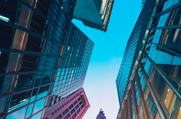 view looking up between skyscrapers