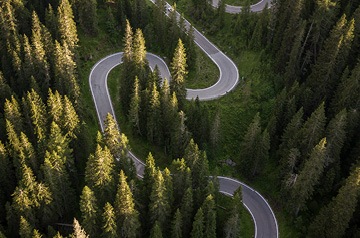 Road winding through a forest.